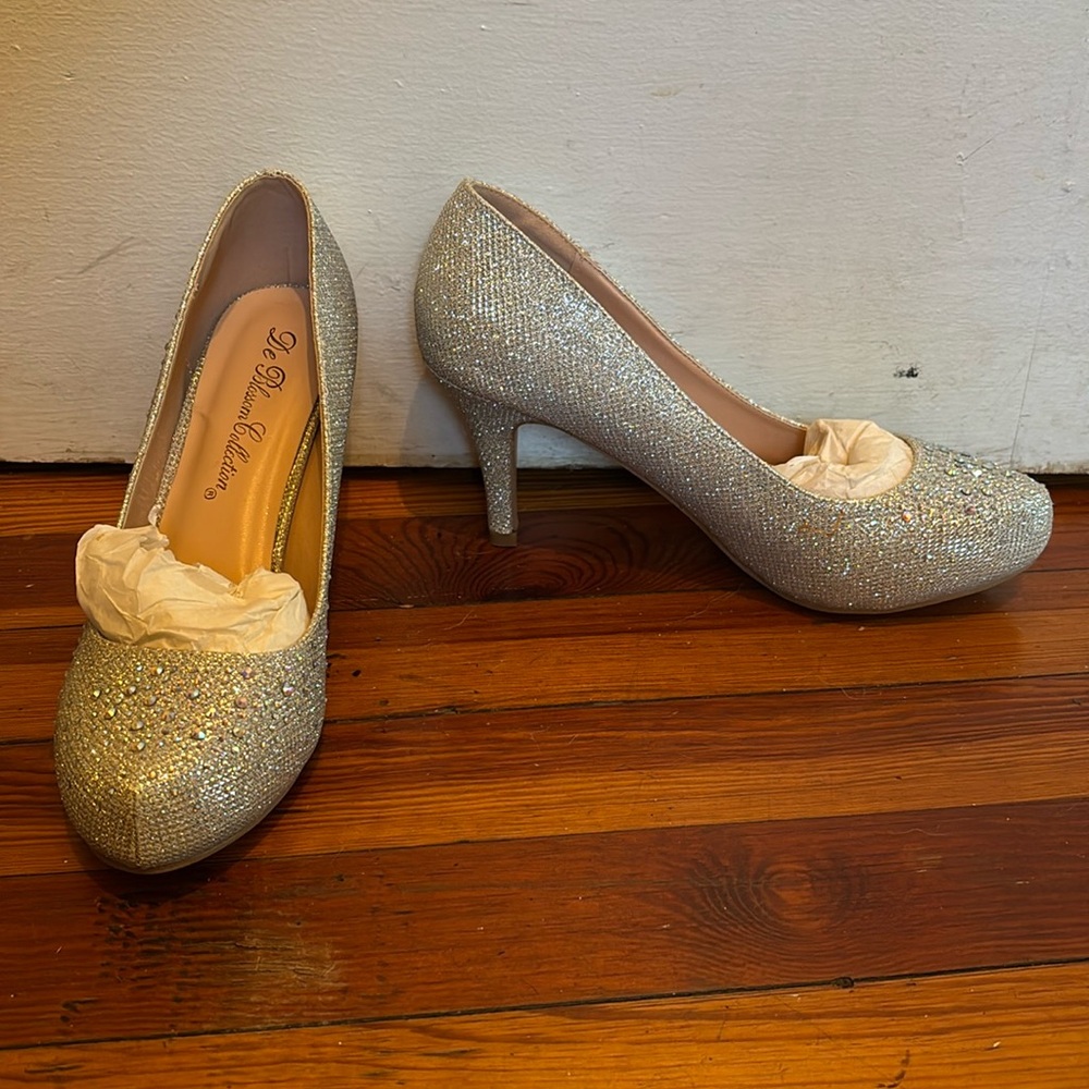 Silver rhinestone pumps